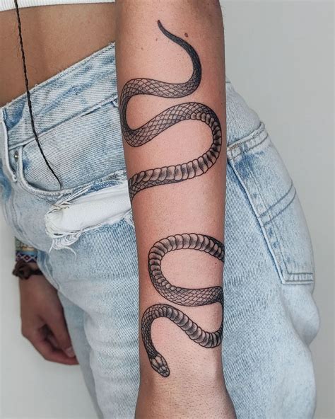 gucci snake tattoo wrapped around arm|snake tattoo around arm.